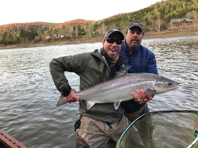 Rob Lewis and an atlantic salmon
